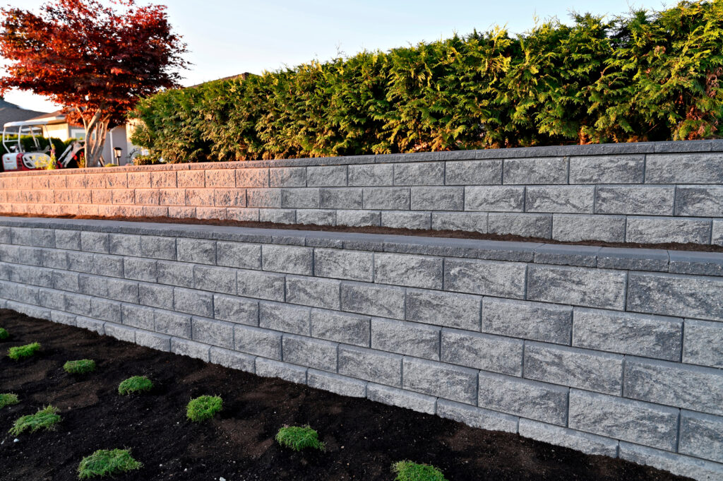 Enhance Your Landscape with Boulder and Retaining Walls from Mountain Top Landscapes